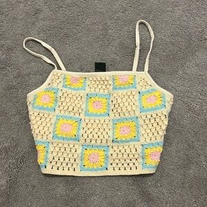 Crochet cropped tank top. Sand color with blue,  pink, and yellow detailing.